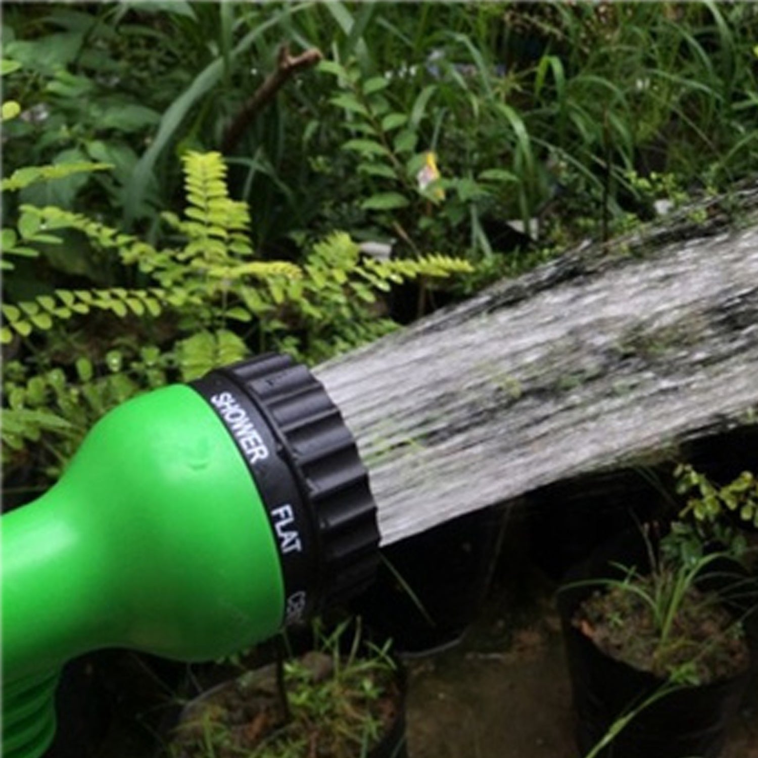 Water spray gun with various attachments. Water spray gun with various attachments.